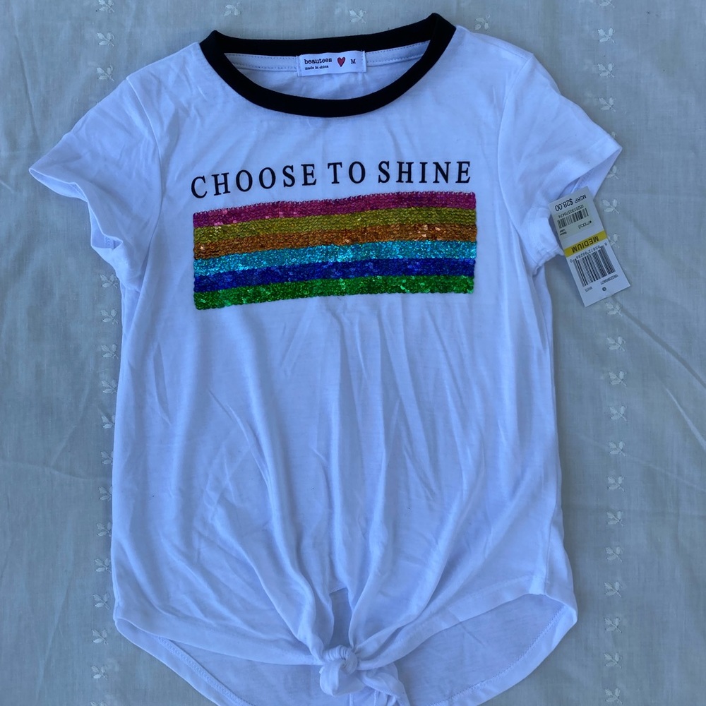 White shirt with rainbow mermaid sequins.